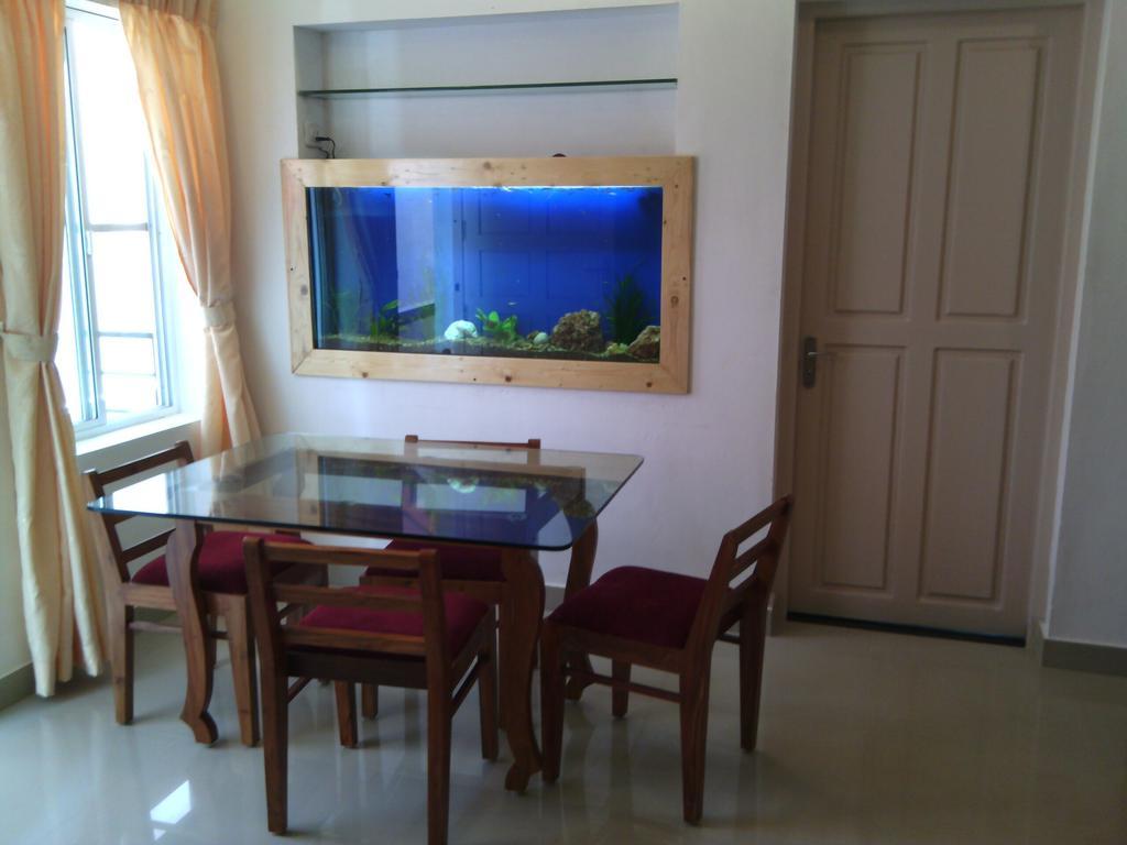 Nathans Holiday Home Kochi Phòng bức ảnh